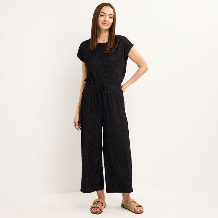 Ladies Black Sleeveless Plisse Top from You Know Who's