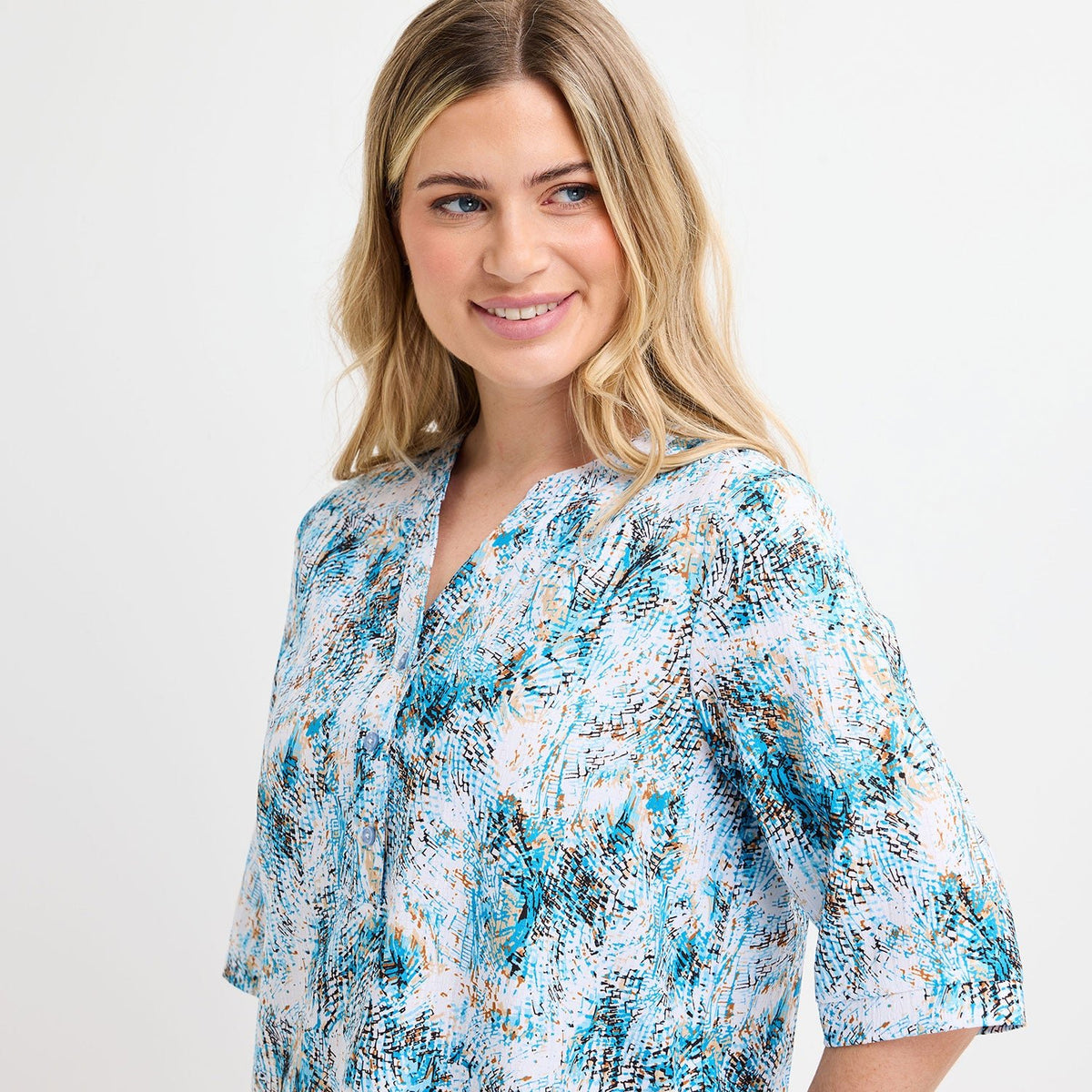 Ladies Blue Printed V - neck Buttoned Blouse from You Know Who's