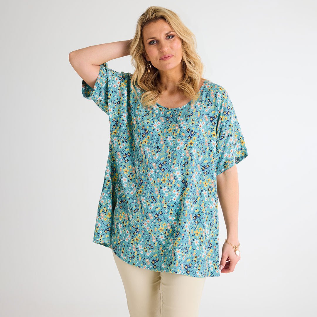Ladies Floral Dipped Hem Top from You Know Who's