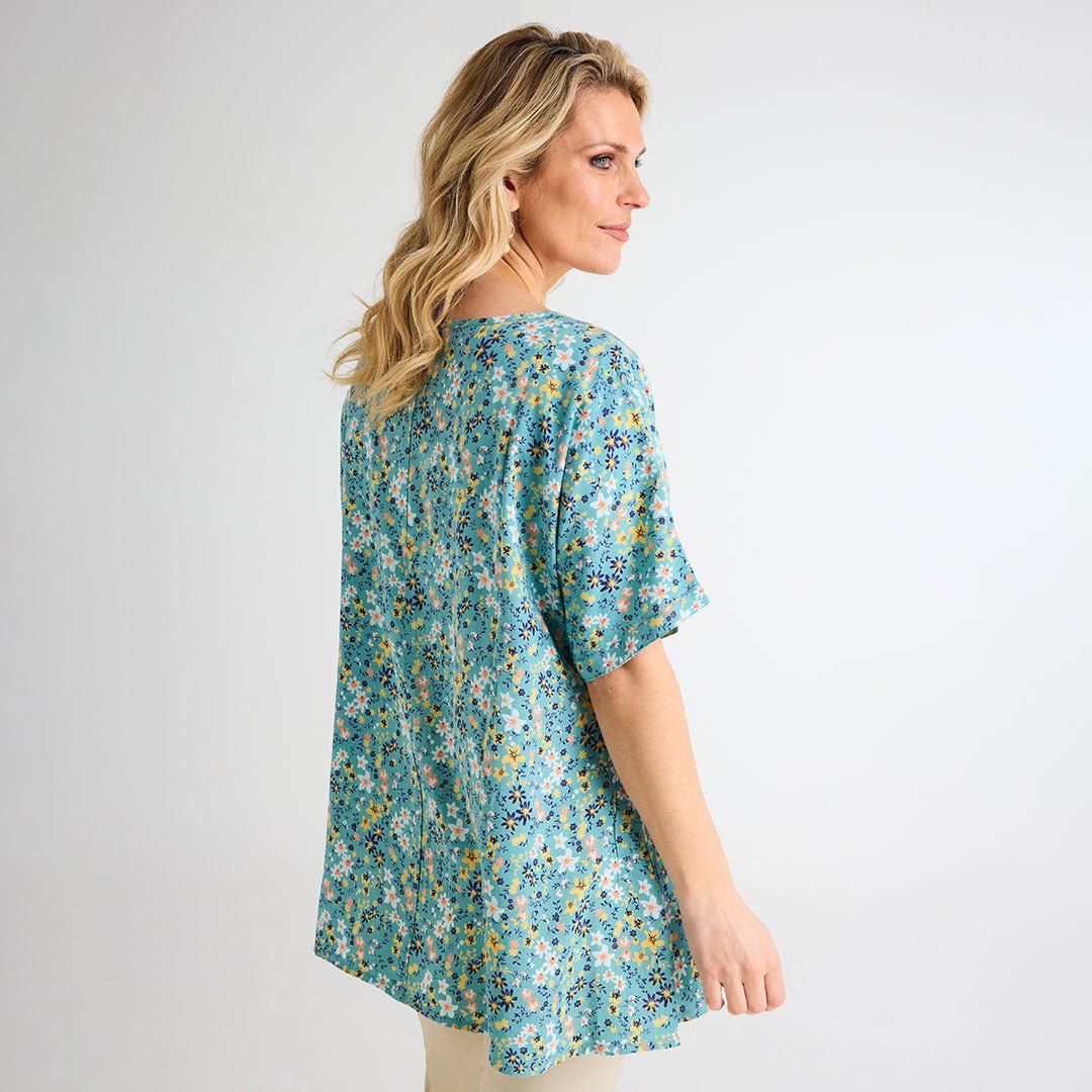 Ladies Floral Dipped Hem Top from You Know Who's